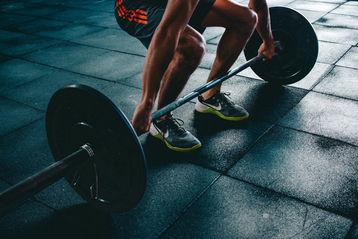 Barbell weights ready for strength training workout to build muscle and burn fat