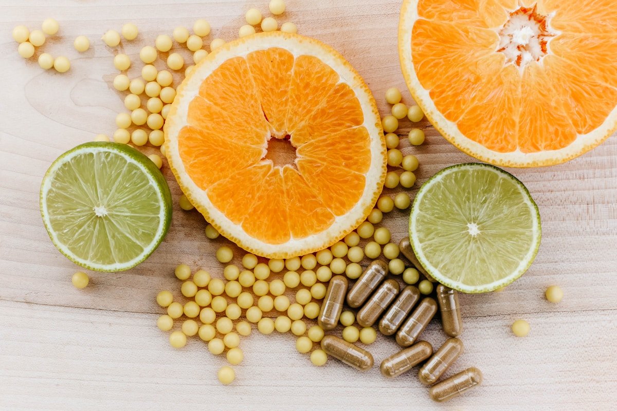 Fresh oranges peas and limes representing whole food alternatives to weight loss supplements