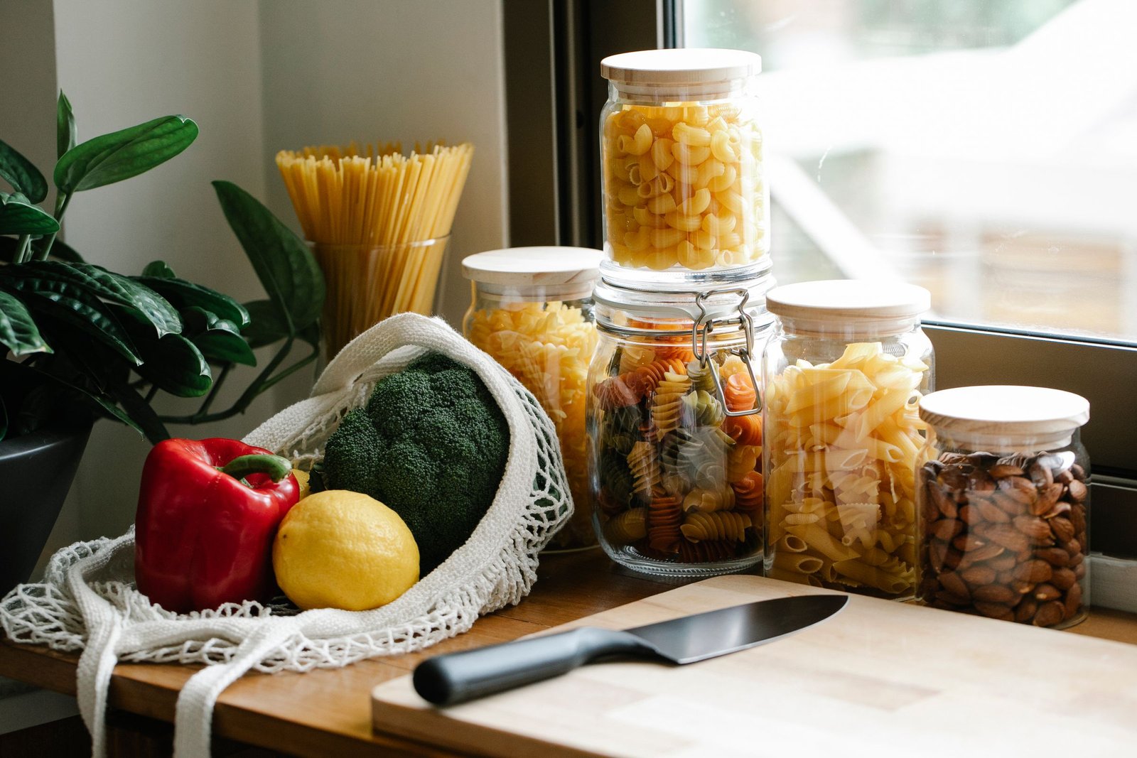 Grocery counter with minimally processed staples beside packaged snacks, illustrating practical ultra-processed food swaps